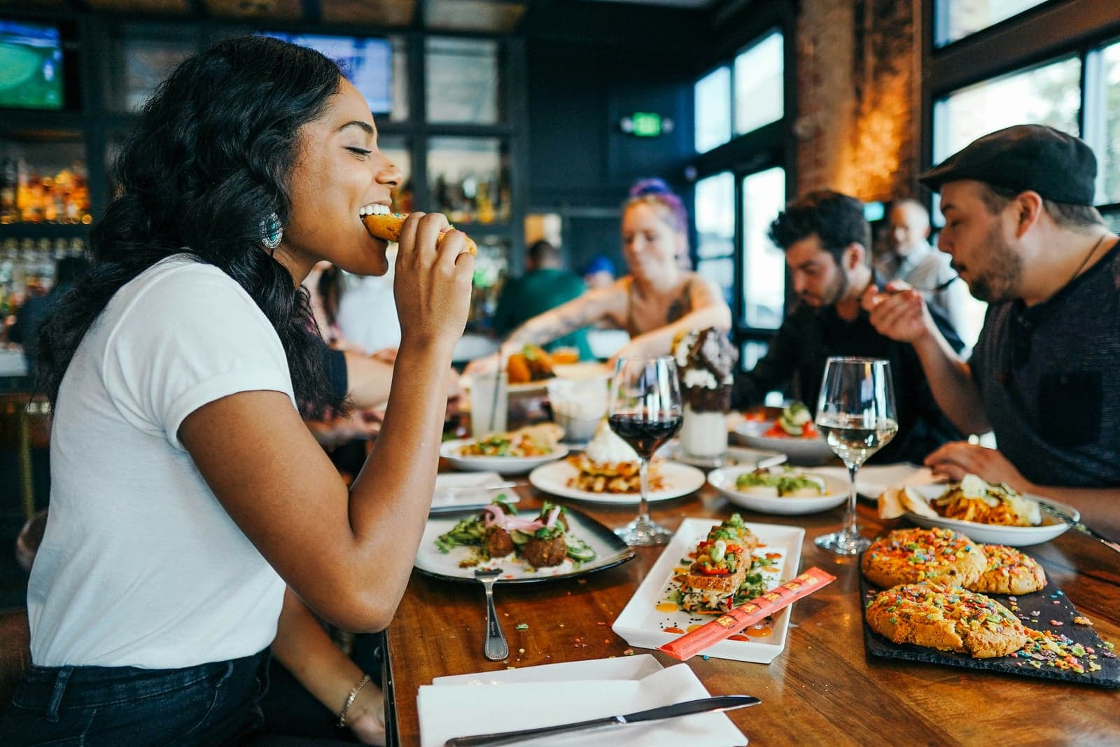 Friends sharing dinner at a local restaurant